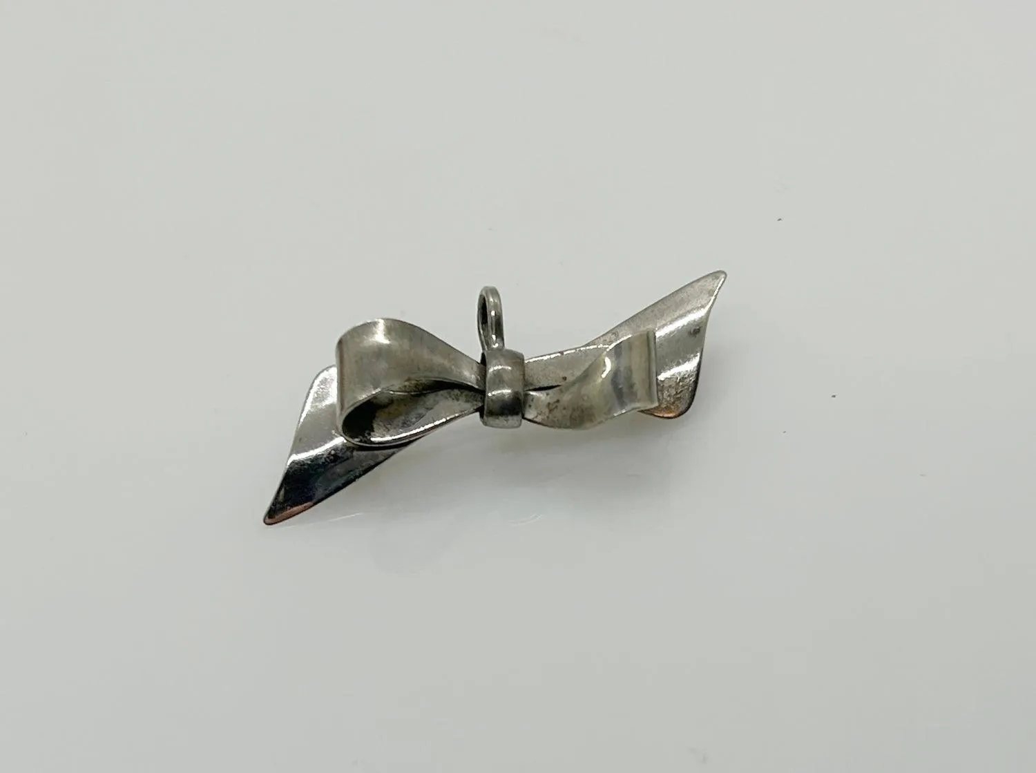 Dainty MK Sterling Silver Bow Brooch/Pendant